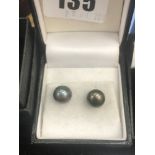 A pair of Tahitian pearl earrings