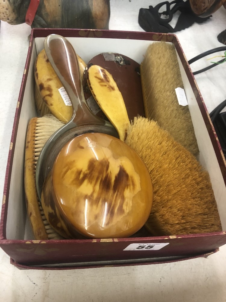 A ladies Bakelite dressing table set