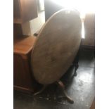 A late Victorian tilt top table,