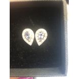 A pair of 18ct white gold diamond and sapphire studs