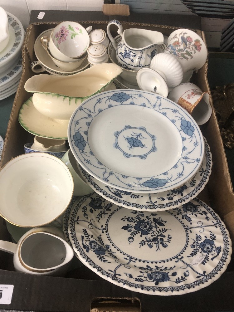 A box of assorted chinaware