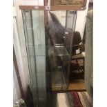 Three tier glass display cabinet