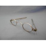 A 19th century pair of hm silver spectacles marked ET