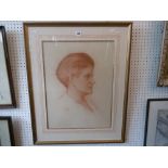 A framed pastel of a woman,