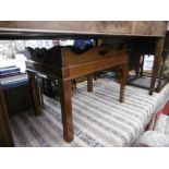 A mahogany butlers tray table