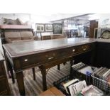 A mahogany writing table