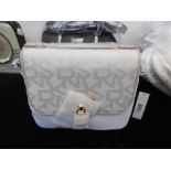A DKNY ivory purse, brand new unused, still has labels etc.
