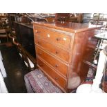 A small chest of four drawers