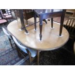 A Gplan extending dining table and four chairs