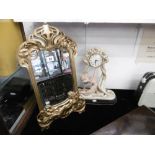 A gilt framed art nouveau mirror and a mantle clock