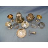 A collection of eleven assorted silver items including napkin rings