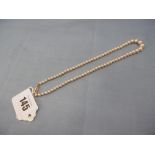 A peal necklace with 9ct yellow gold clasp