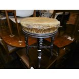 A 19th century revolving piano stool