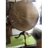 A late Victorian tilt top table,