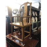 A pair of oriental elbow chairs