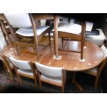 A retro Dyrland table with two leaves and six chairs