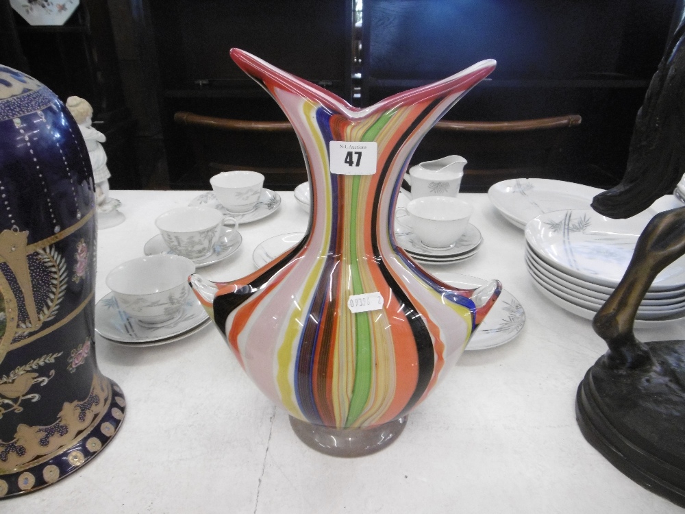 A multi colour studio glass vase