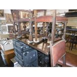 An oak refectory table and five chairs