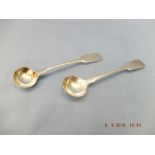 A pair of Victorian hallmarked silver fiddle pattern salt spoons