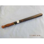 A Victorian turned wood truncheon painted in gilt with "C.D.C.