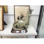 An oriental glazed pottery dragon figure A/F