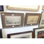 A pair of gilt framed etchings,