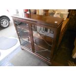 A mahogany glazed bookcase