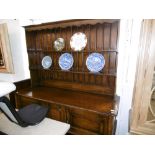 AN OAK DRESSER (CIRCA 1920) STAMPED MAPLES ON BACK, 152X190CM APPROX.