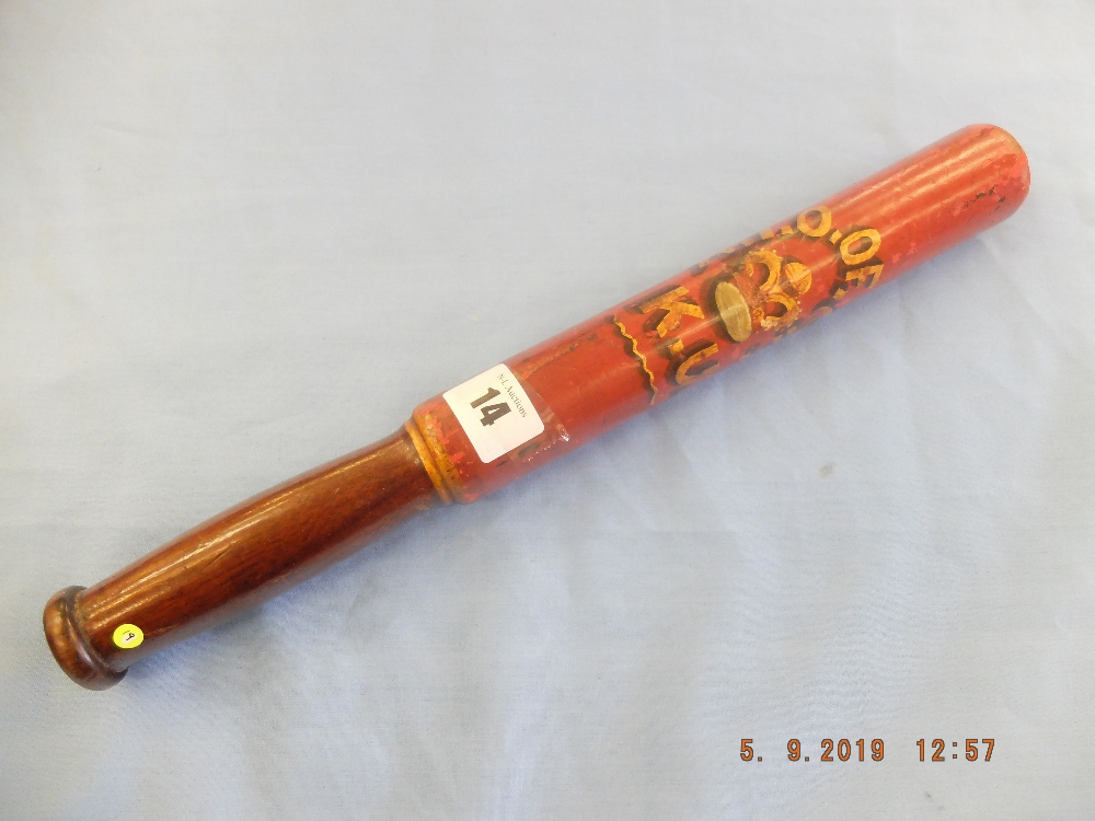 A 19th century turned wood truncheon painted with "A.E.O" of "O.F.K.