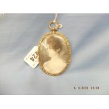 A Regency period early 19th century framed miniature painting of a young lady in a gilt lady metal