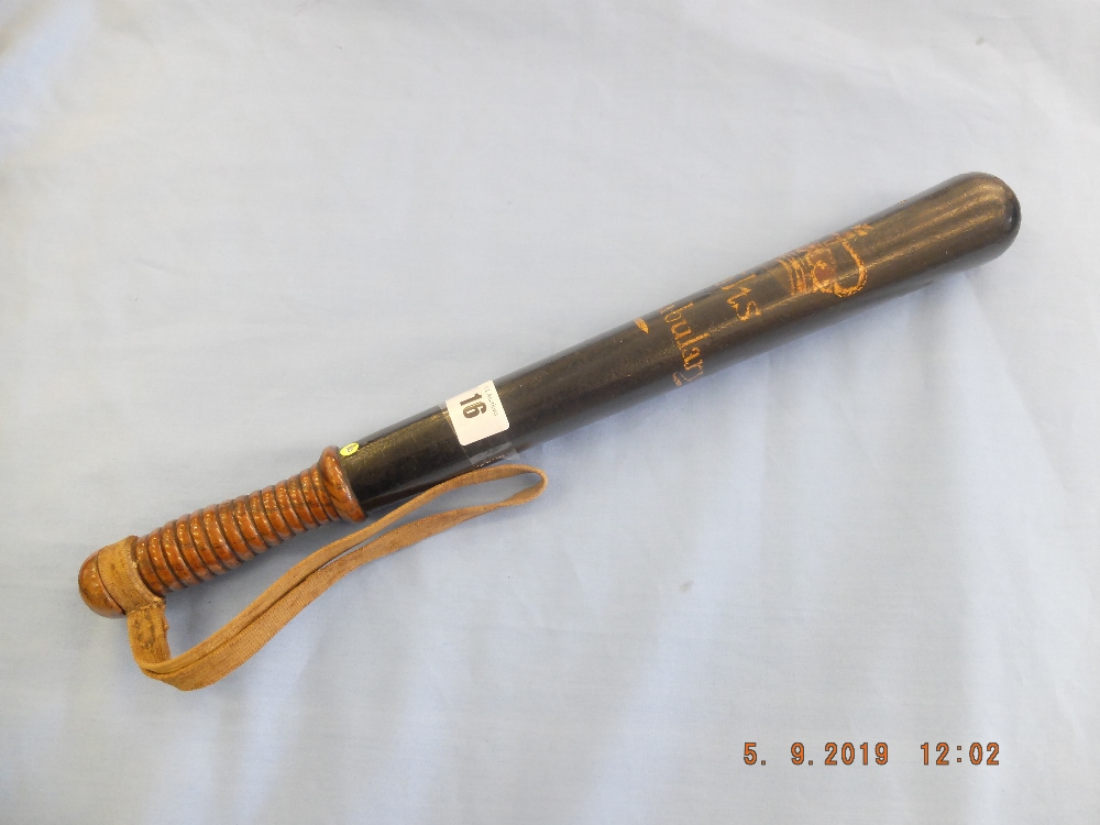 A Victorian turned wood truncheon painted with crown over "Wilts Constabulary" on a black ground