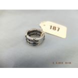 A Chanel 18ct white gold and ceramic flex ring,