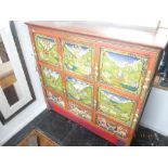 A decorative hand painted oriental cupboard, H 122cms D44.