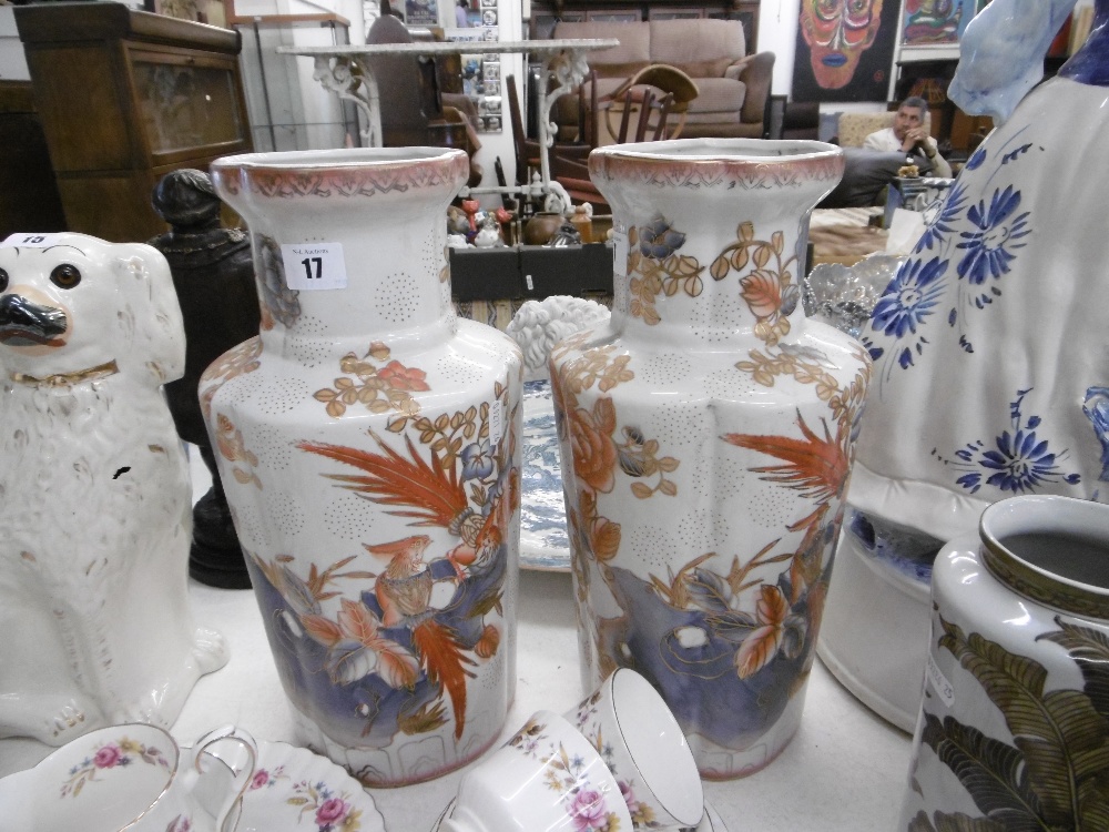 A pair of white and orange oriental vases - Image 3 of 8