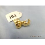 A pair of 18ct yellow gold and diamond earrings weight 10 grams