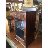 A 19th century mahogany music cabinet