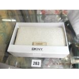 A DKNY - Hemp-sand, code 264, brand new unused, still has labels etc.