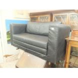 A leather sofa bed
