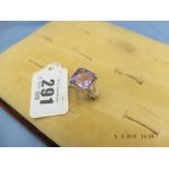 An 18ct gold amethyst and diamond ring,