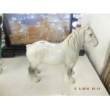 A grey Beswick shire horses