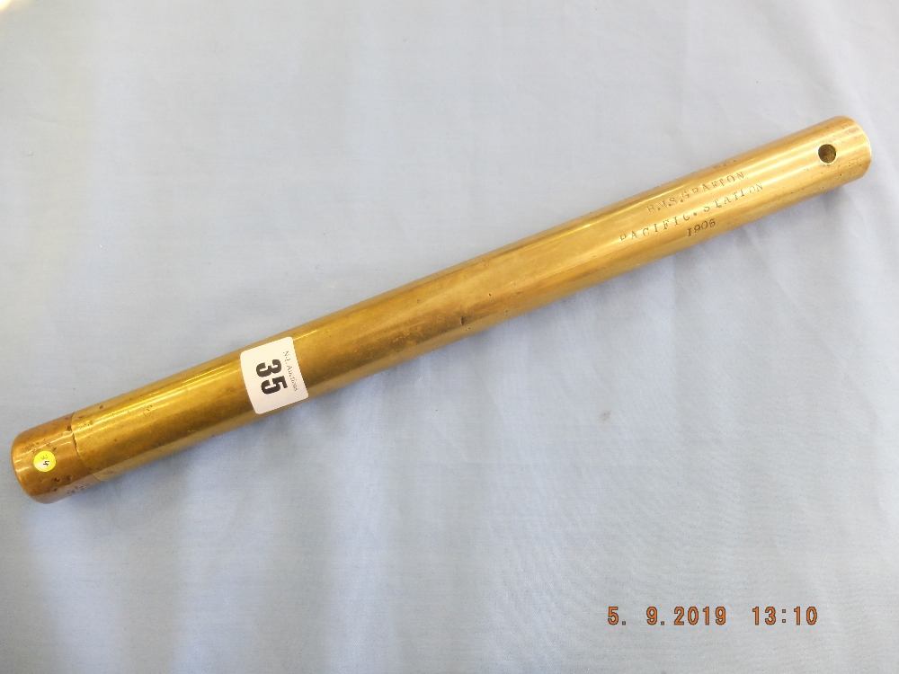 An Edwardian cylindrical brass short staff stamped " C.R Spice. Warder R.N HMS.