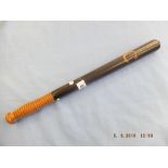 A Victorian turned hardwood truncheon painted with "CS", with ribbed handle,