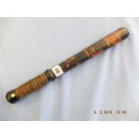 A Victorian turned wood truncheon painted with crown over " VR" over "LT over Parish" on a black