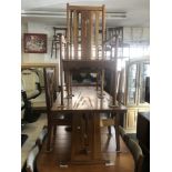 An arts and crafts style refectory table and four chairs by Reynolds of Ludlow after Charles Rennie