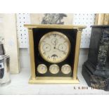 A fine quality Asprey & Co moon face brass cased clock (A/F) battery operated,