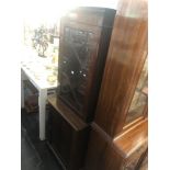 A mahogany bookcase on cupboard base