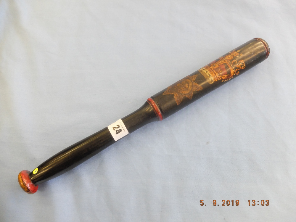 A Victorian truncheon painted with crown over a eight pointed star with cross within a circle