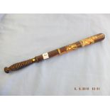 A Victorian turned rosewood truncheon painted with crown over "VR" cipher over "Patrick",