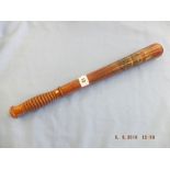 A Victorian turned wood truncheon, painted with "V.R2, over "G.S.