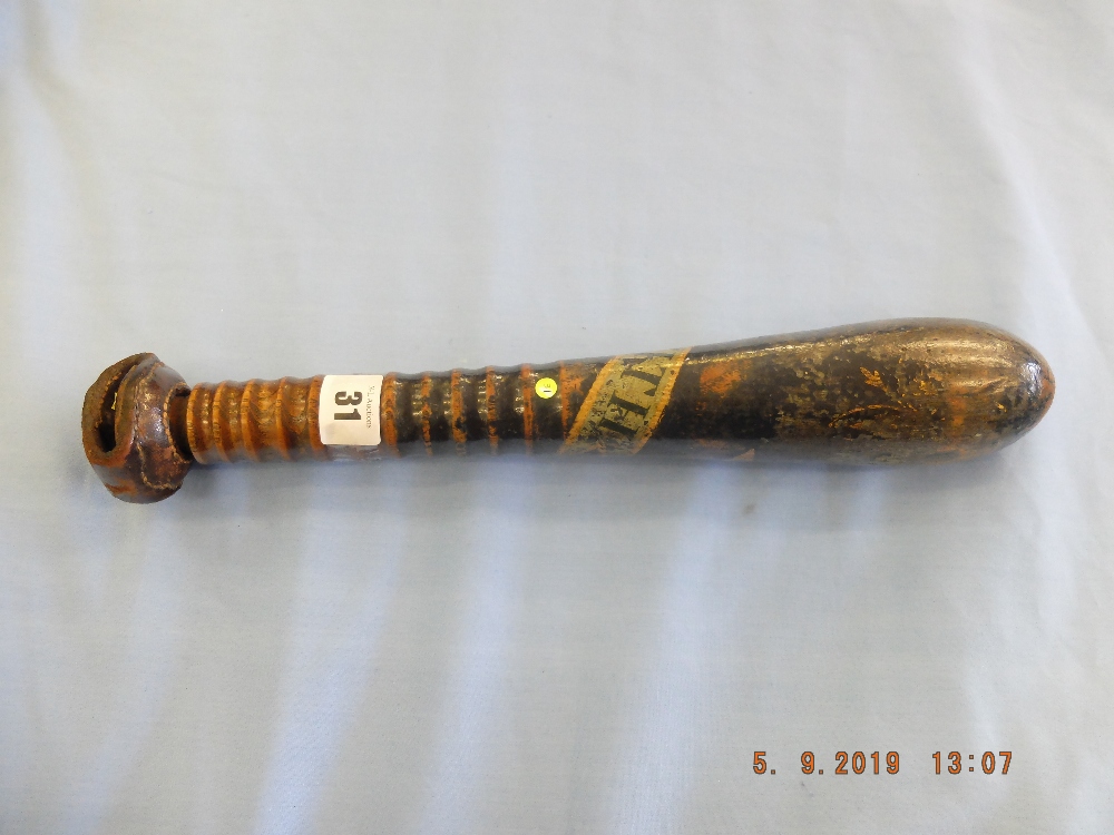 A 19th Century torpedo shaped wooden truncheon painted " Jas.